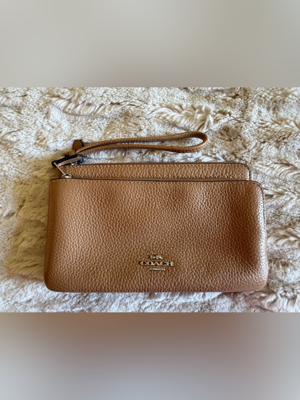 Coach Pebbled Leather Wristlet in Cognac Brown